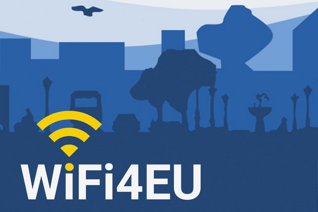 Logo des WiFi4EU mit einer blauen stilisierten Stadt im Hintergrund